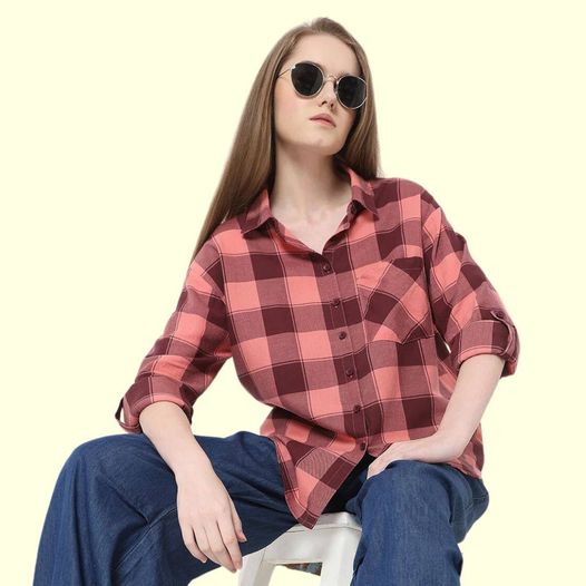 This oversized checkered shirt is big on comfort and style. Wear it buttoned up or open for a relaxed vibe.